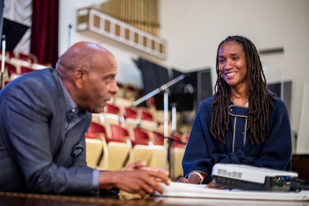 State Sen. Steven Bradford and lawyer Lisa Holder speak during the second day of an in-person meeting of the California Reparations Task Force at the Third Baptist Church in San Francisco on April 14, 2022.